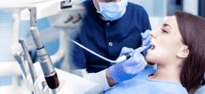 Donna in seduta di igiene orale dal dentista.